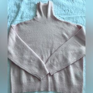 On 34th Macy’s Pink Knit Sweater.